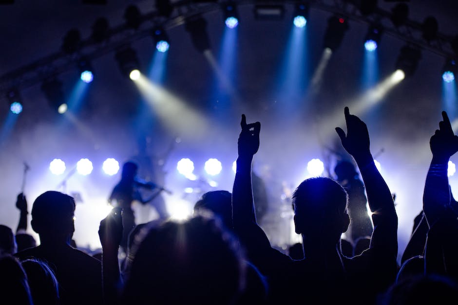 Image description: Image of people enjoying music at festivals