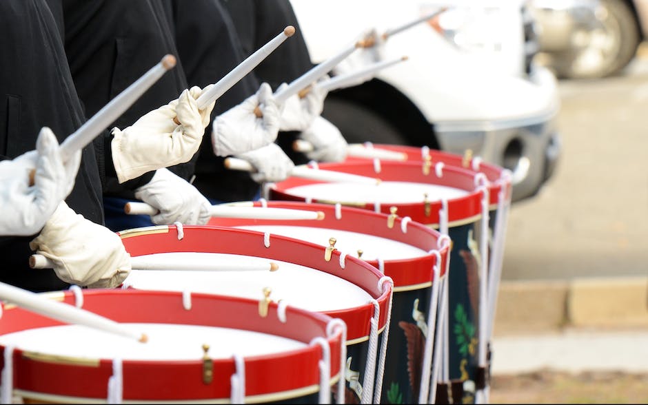 Image describing the diversity of music, capturing a variety of musicians and instruments playing together on a global stage